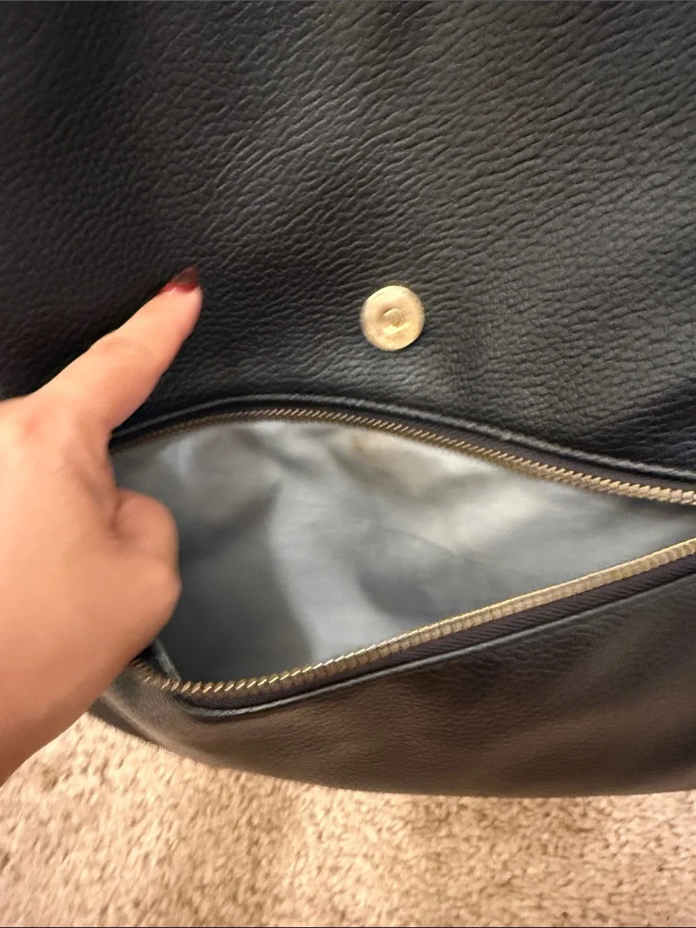 Freshly picked black leather diaper bag
